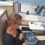 Embroidery activity on the Makeva sailing boat